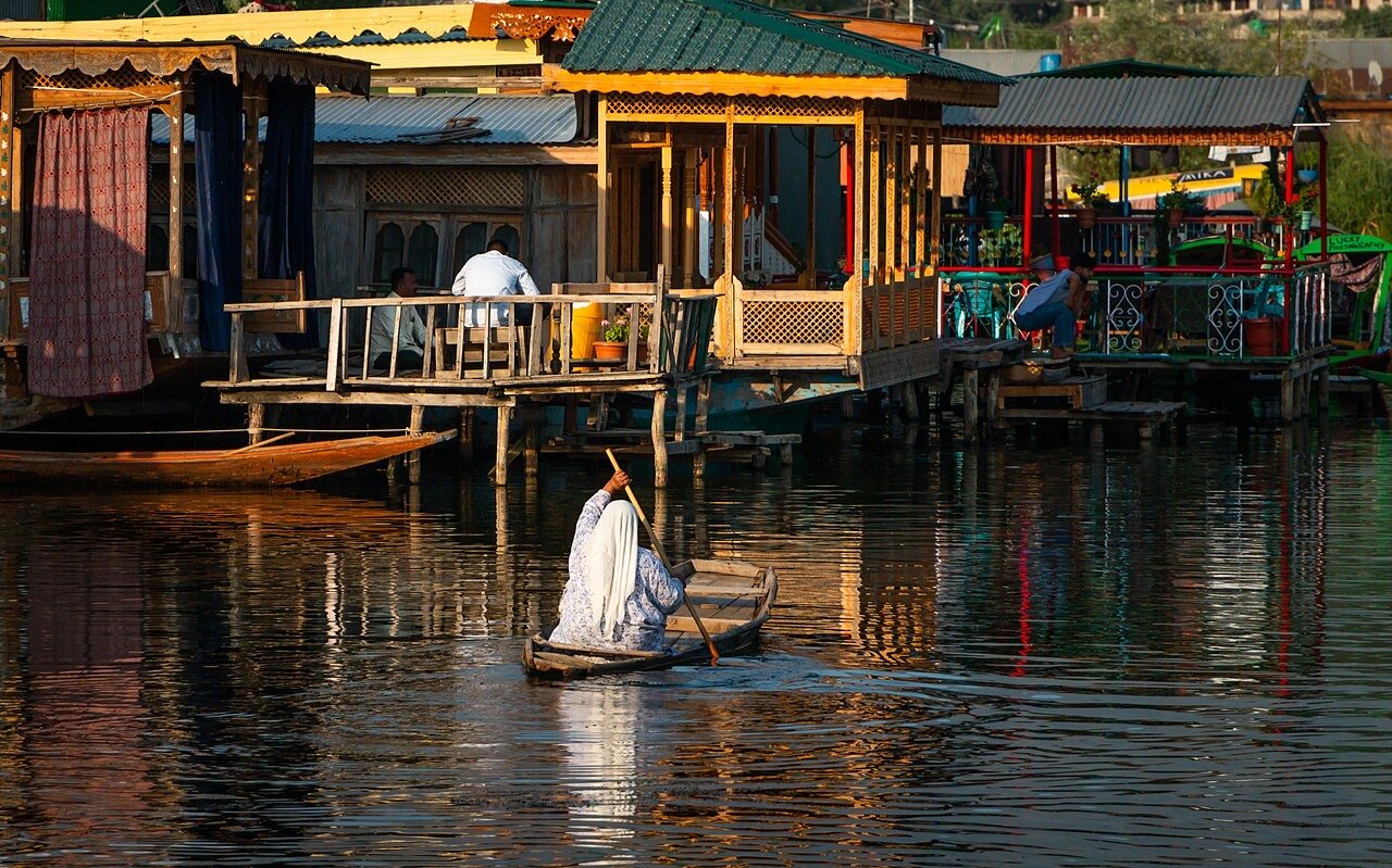 Traditional wooden houseboats on Dal Lake, Srinagar, a popular stay for solo travellers